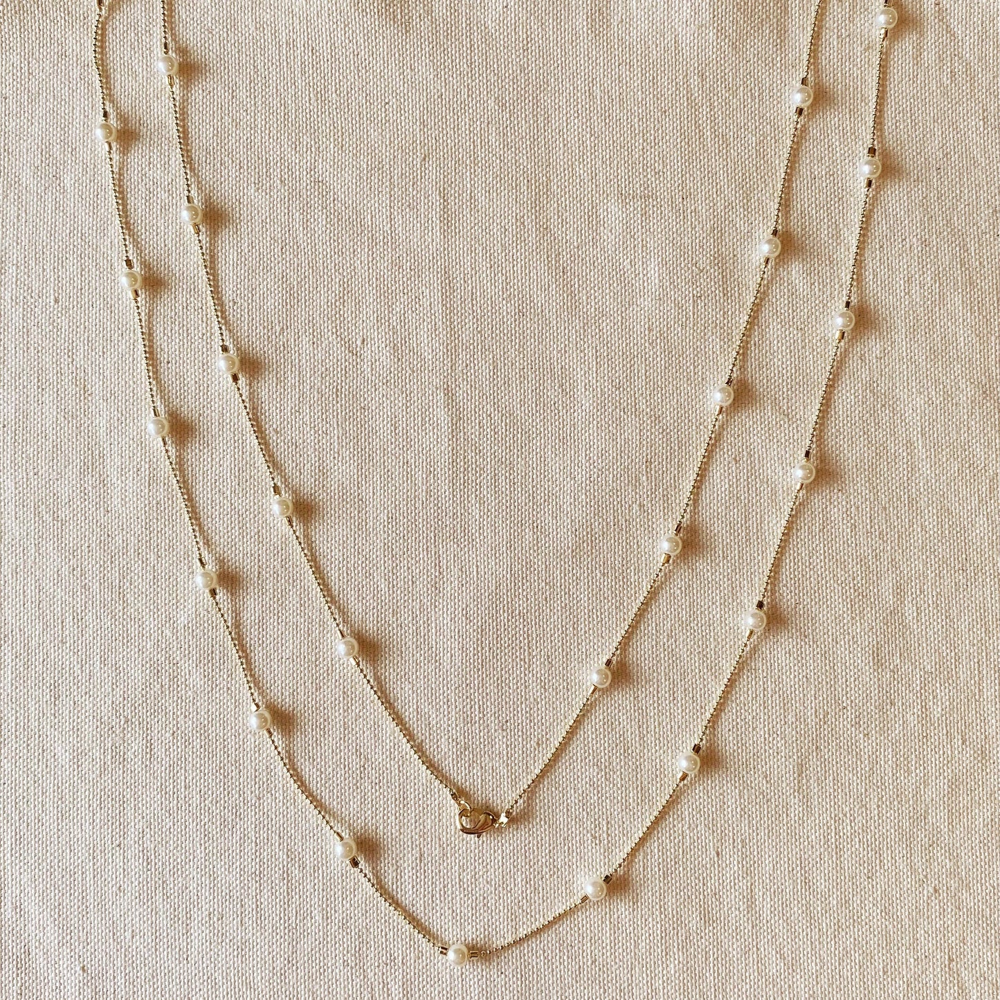 18 karat gold filled long 42 inch spaced out pearl necklace hypoallergenic anti-tarnish wrap around