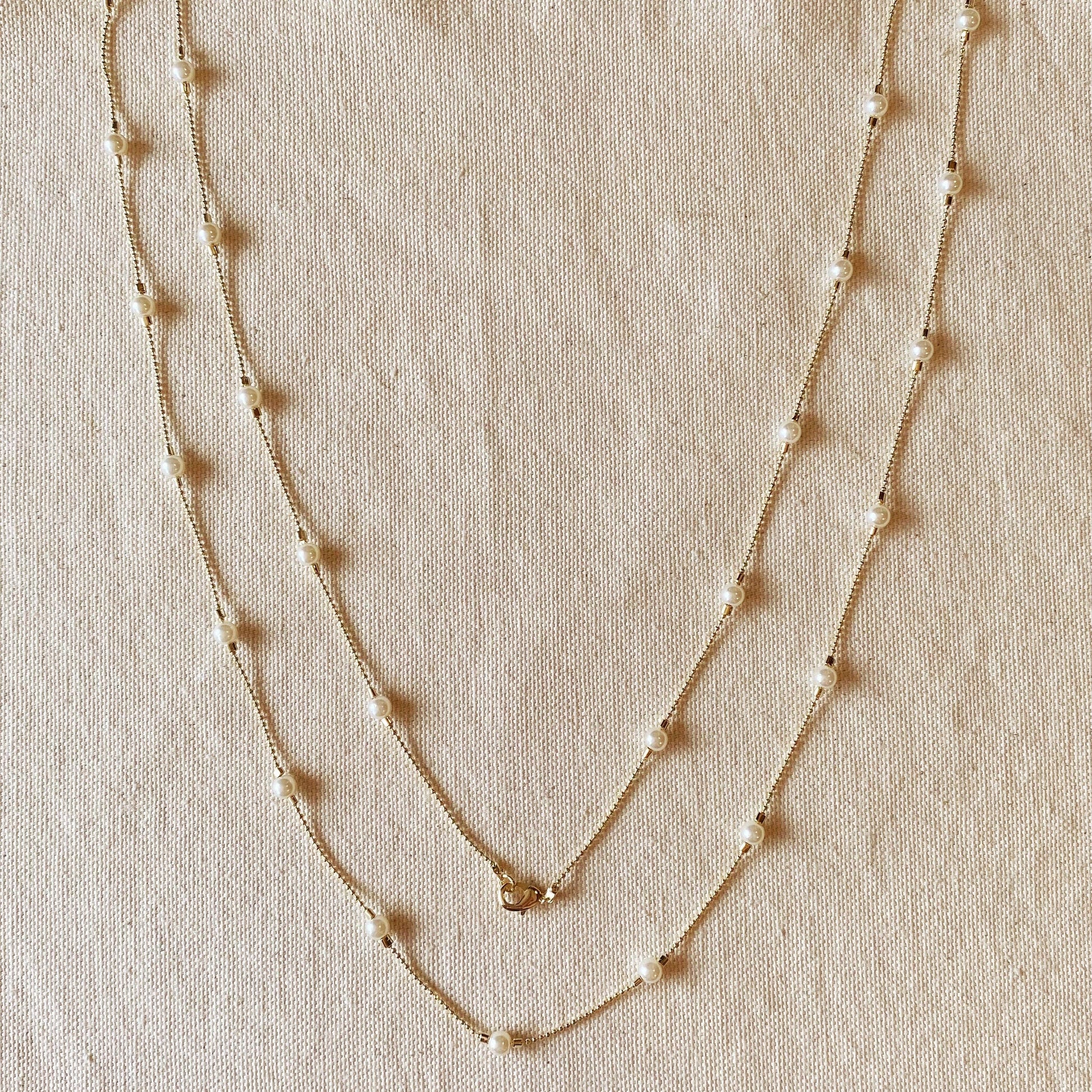 18 karat gold filled long 42 inch spaced out pearl necklace hypoallergenic anti-tarnish wrap around