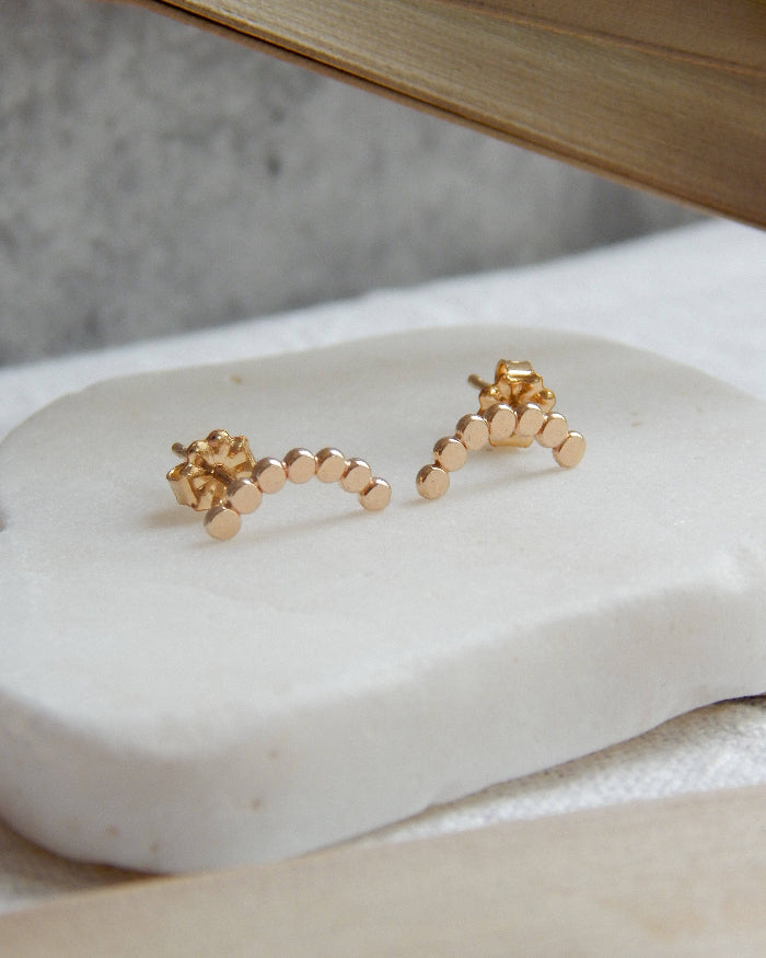 Pebble arc stud earrings detailed view 14k gold fill
