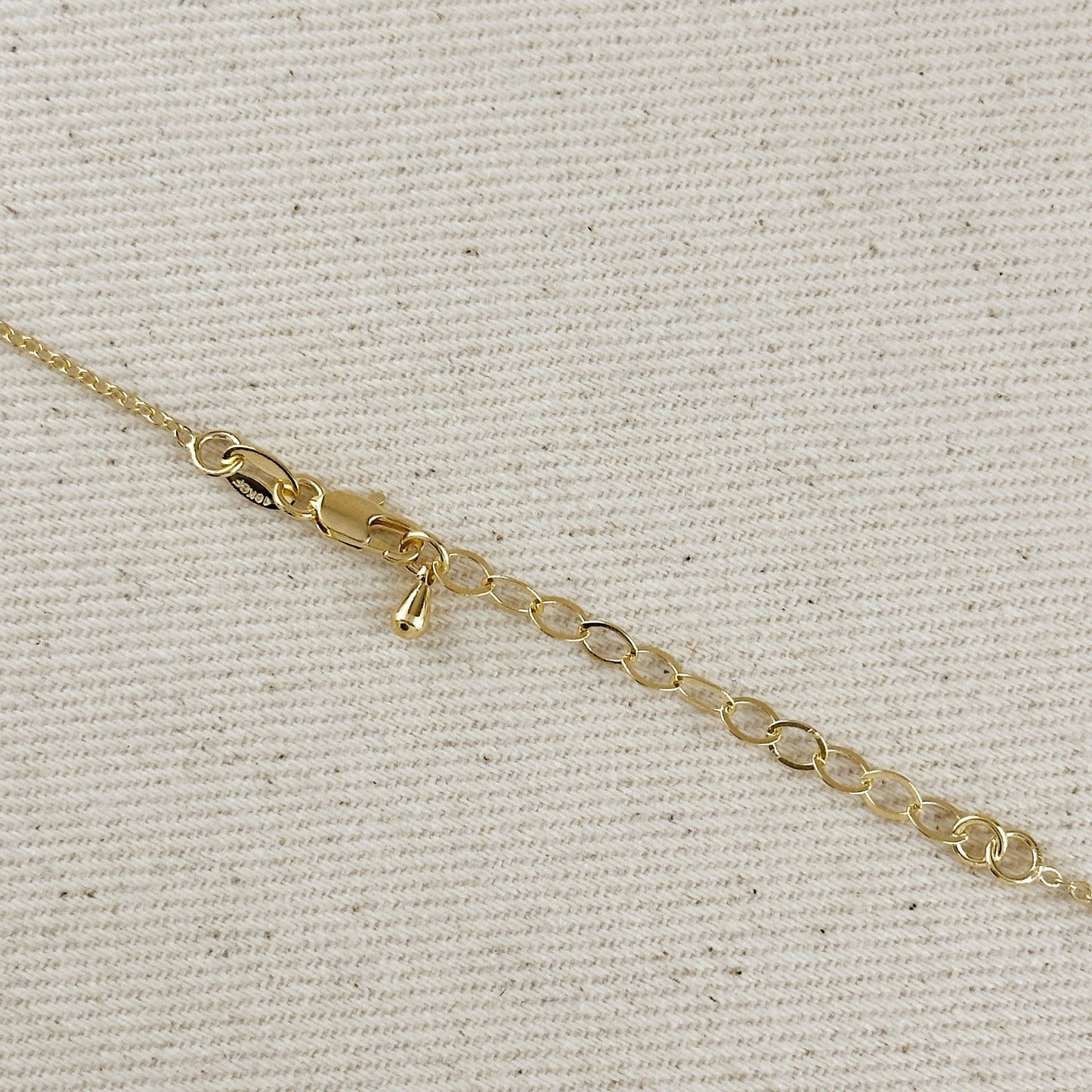 delicate gold filled chain necklace clasp with oval solitaire pendant