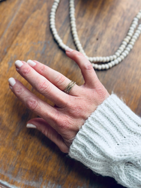 Rope style ring in gold filled, close up to show texture and minimal style