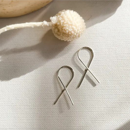 Sterling silver ear ribbon earrings detail