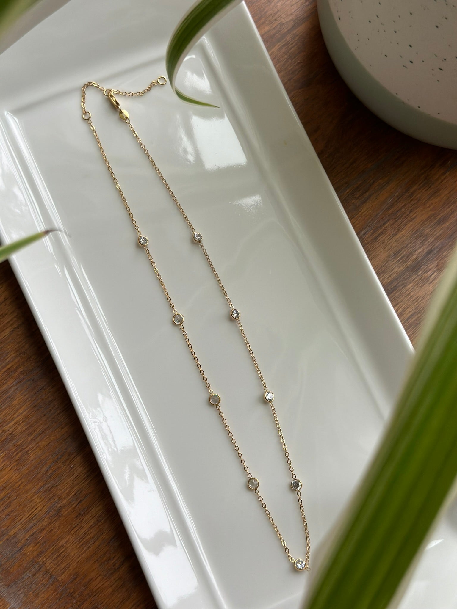 bezel set cubic zirconia tin cup necklace gold filled chain detail