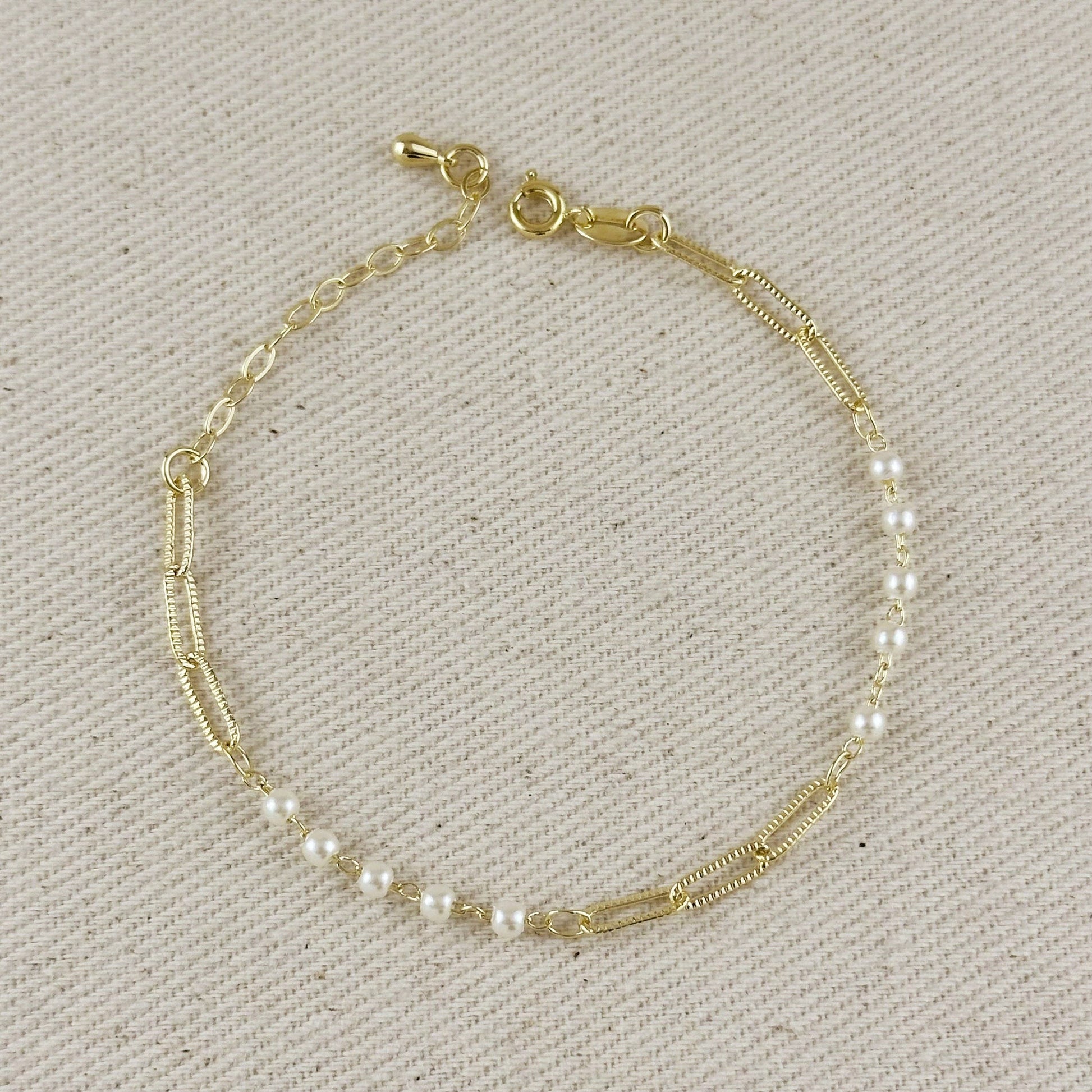 18K gold filled diamond cut paperclip and pearl bracelet close up