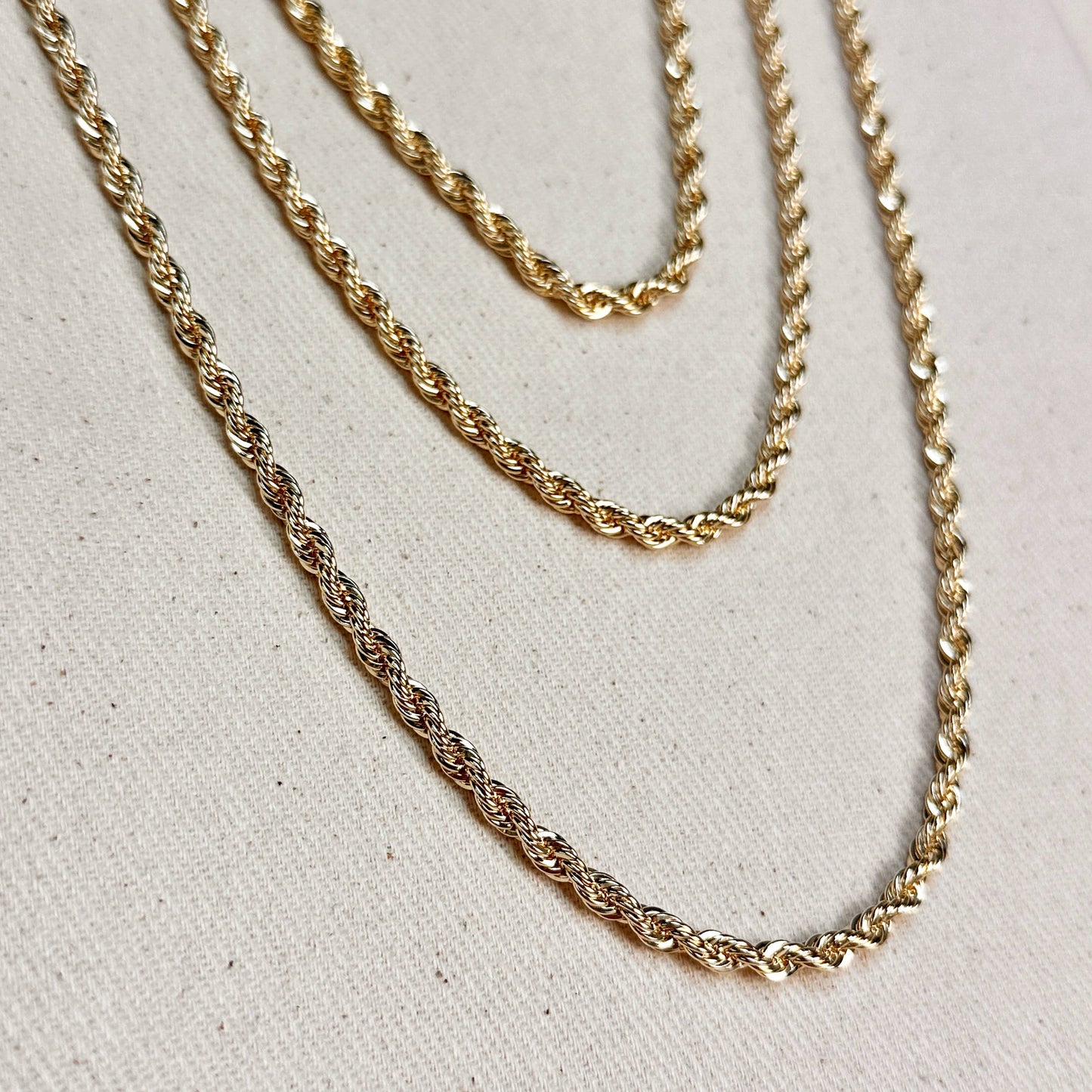 layered styling of elegant rope chain necklace in 18k gold filled