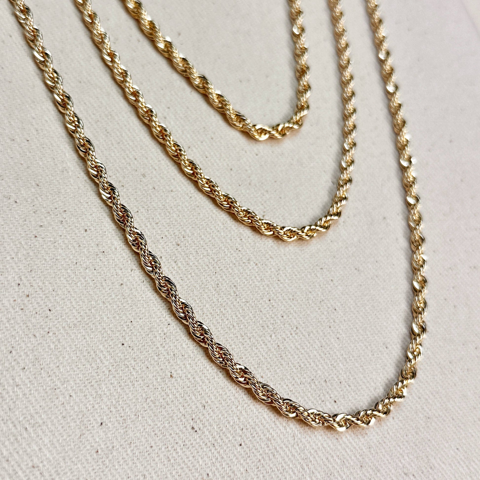 layered styling of elegant rope chain necklace in 18k gold filled