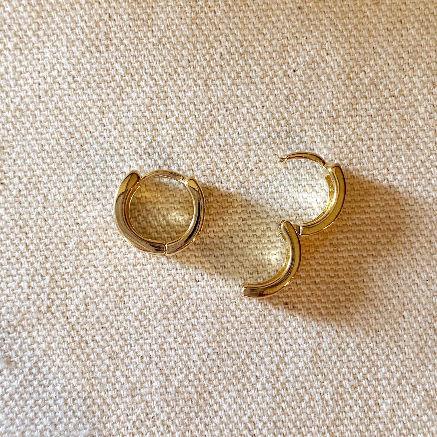 Gold Chunky Flat mini huggies earrings showing clasp