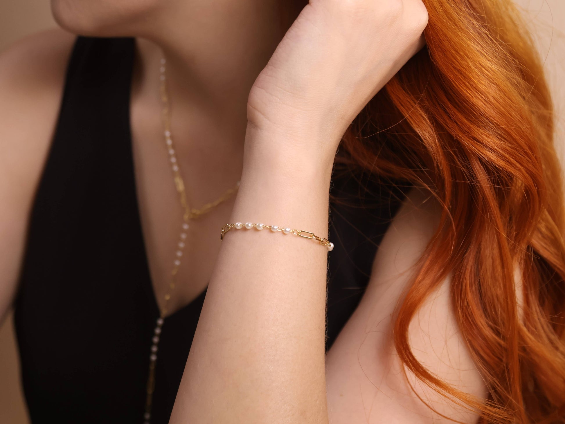 pearl and 18k gold paperclip bracelet wrist styling