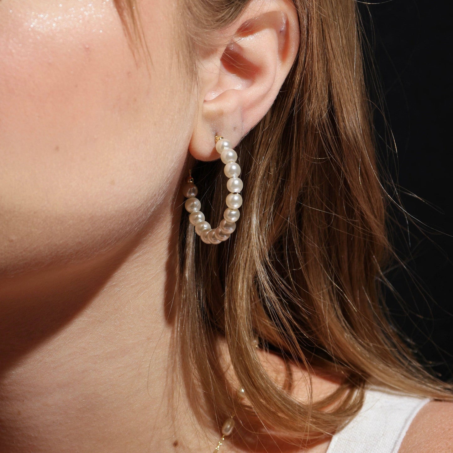 35mm Pearl hoop earrings 18k gold filled shown on woman