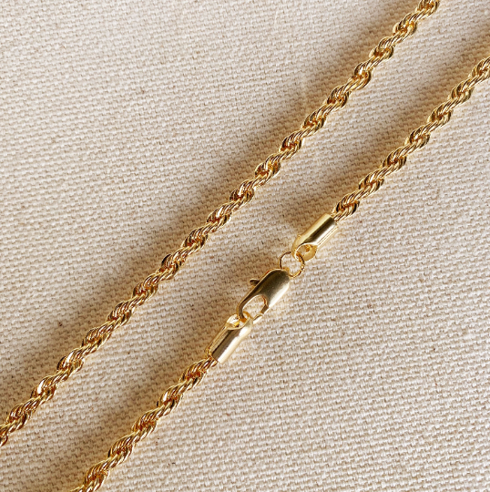 close up of rope chain 18k gold fill necklace on neutral background